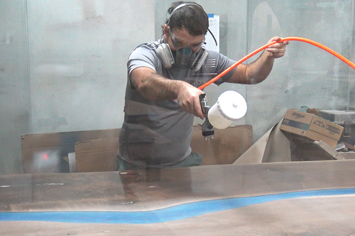 adding a spray finish to an epoxy ocean table