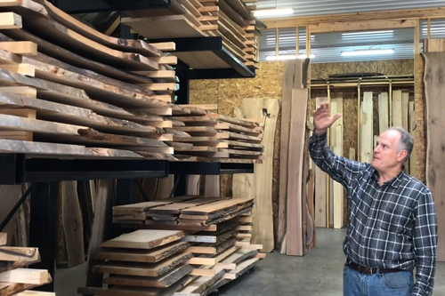 Sheldon Myeroff selecting wood slabs for custom epoxy river tables to sell