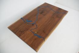 CNC Engraved Walnut River Table With Embedded Objects 1